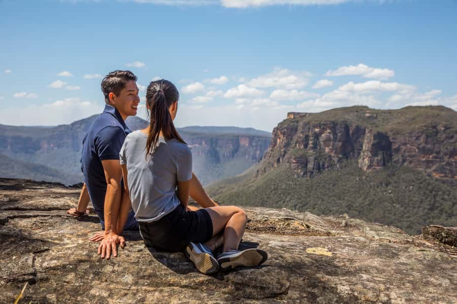 Sydney: Waterfall Bushwalk and Blue Mountain Sunset Day Trip - Meeting in Sydney and riding west