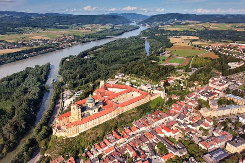 Vienna: Hallstatt, Salzburg, Melk, Alps & Lakes Day Trip - Salzburg in two hours